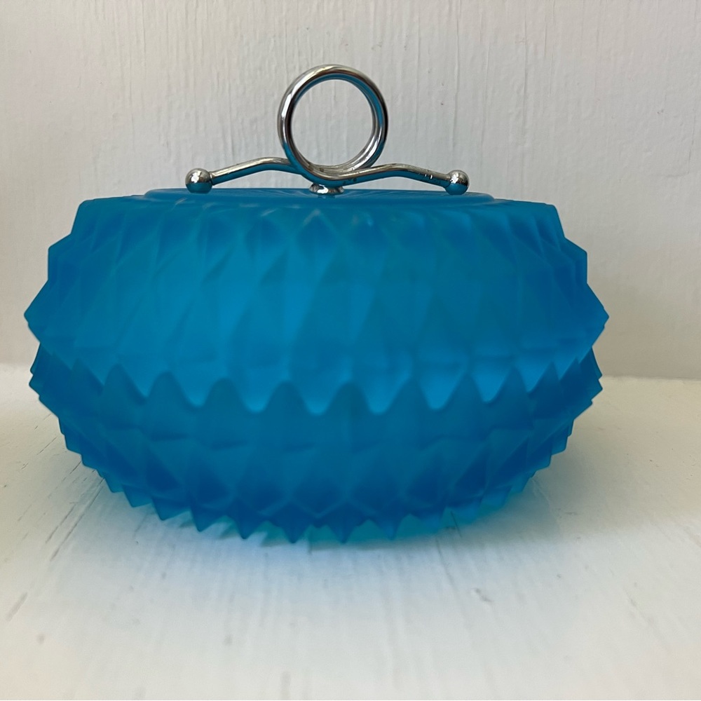 Beautiful glass container with lid.